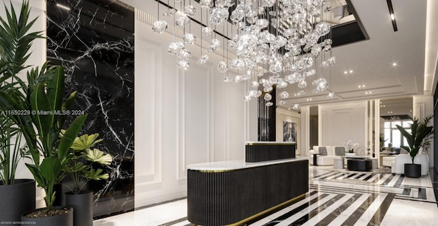 welcome area with an inviting chandelier