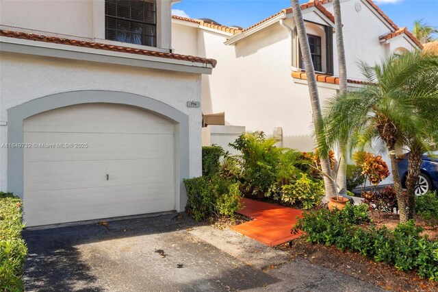 view of front of house with a garage