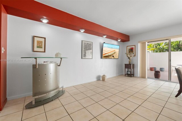 garage with a garage door opener and white fridge