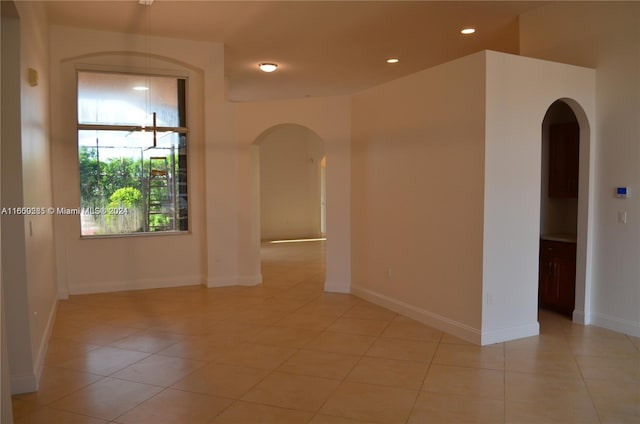 view of tiled spare room