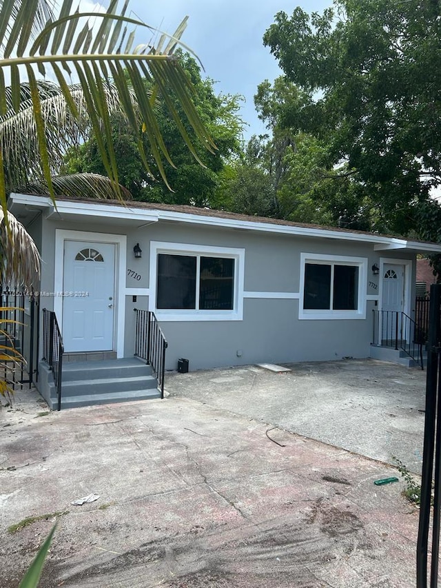 single story home with a patio