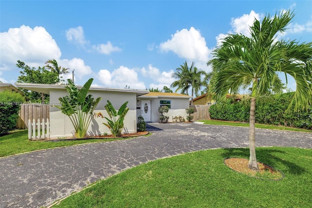 view of front of home with a front yard