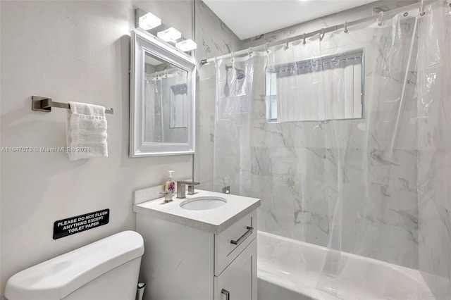 full bathroom with vanity, toilet, and shower / bath combo