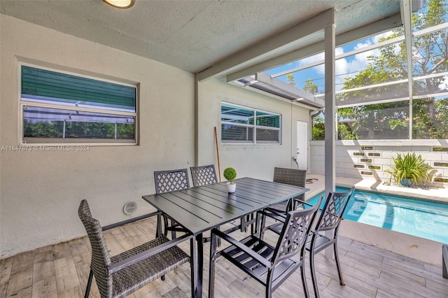 view of patio featuring a fenced in pool