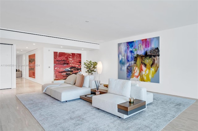 living area featuring recessed lighting and wood finished floors