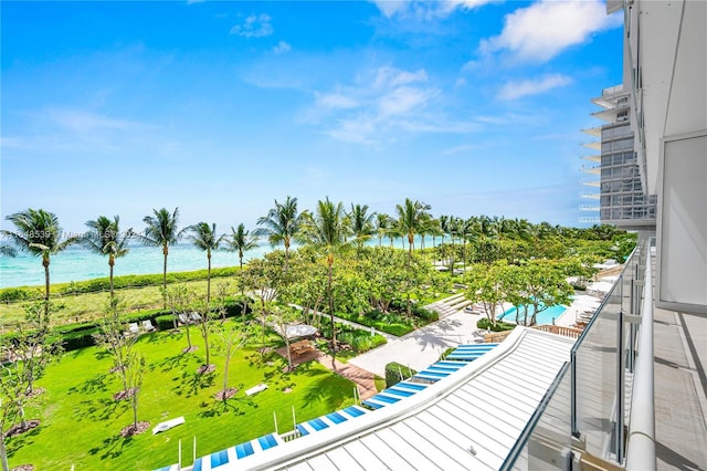 balcony featuring a water view