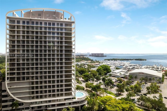 view of building exterior featuring a water view