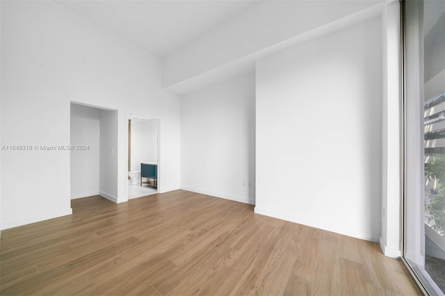 unfurnished living room with light wood-type flooring