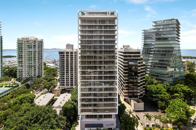 view of building exterior with a water view