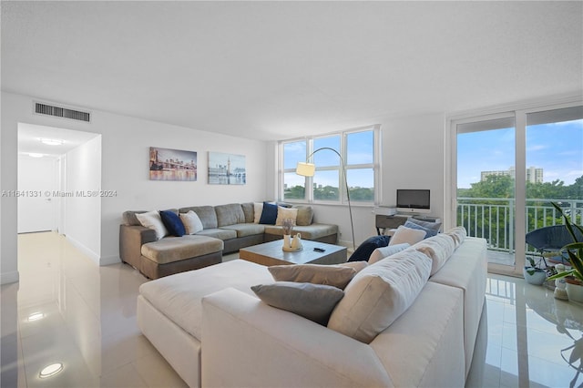 living room featuring light tile patterned floors