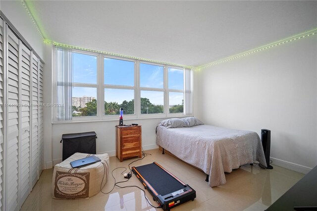 bedroom with multiple windows