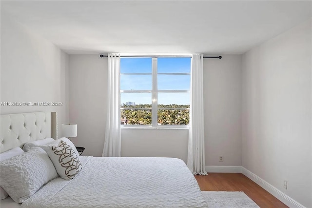 bedroom featuring hardwood / wood-style flooring