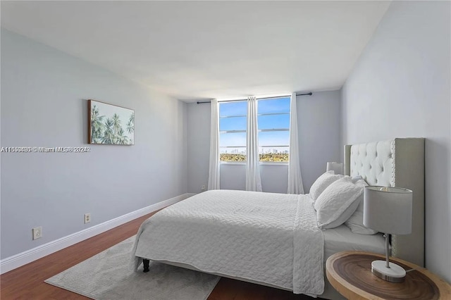 bedroom featuring dark hardwood / wood-style floors