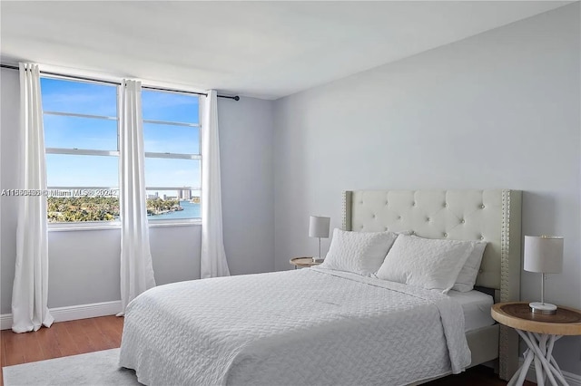 bedroom featuring hardwood / wood-style floors