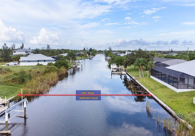 view of water feature with a dock