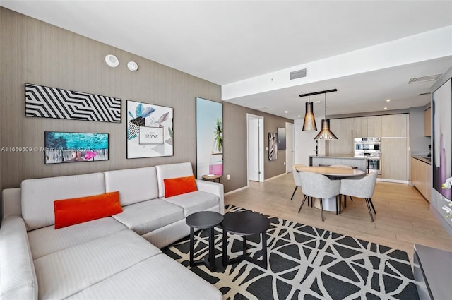 4010 S Ocean Dr Unit T3507, Hollywood, FL 33019 - living area featuring light wood-style floors and baseboards