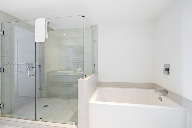 4010 S Ocean Dr Unit T3507, Hollywood, FL 33019 - full bath with a garden tub and a stall shower