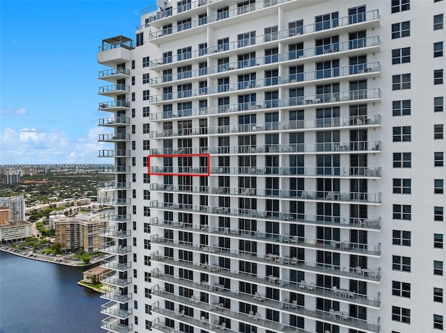 view of property with a water view