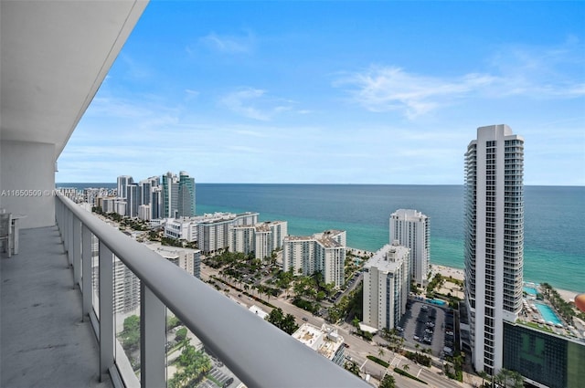 balcony featuring a water view