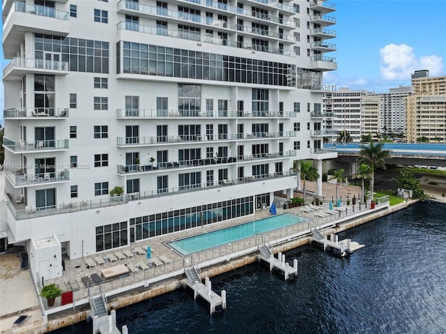 view of building exterior featuring a water view