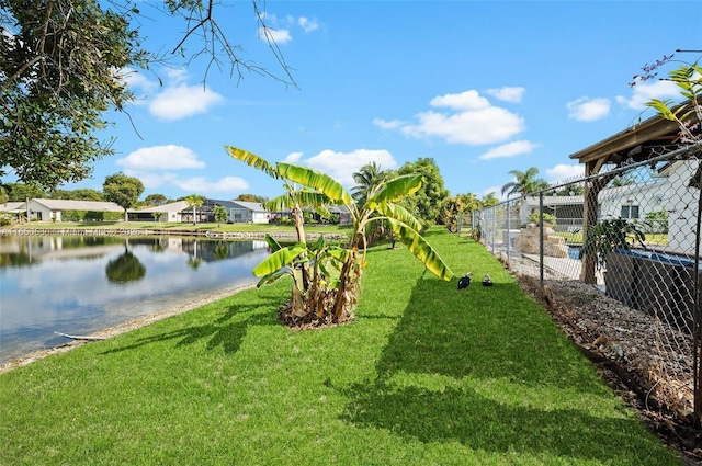 view of yard with a water view