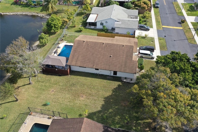 birds eye view of property featuring a water view