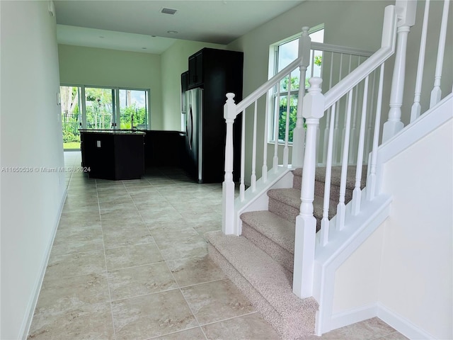 stairs with plenty of natural light