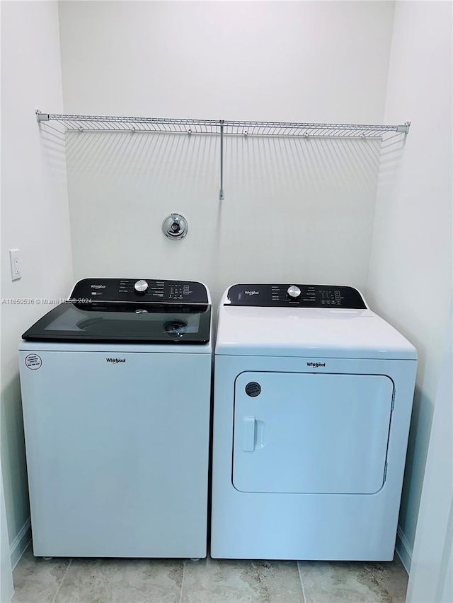 laundry room featuring independent washer and dryer