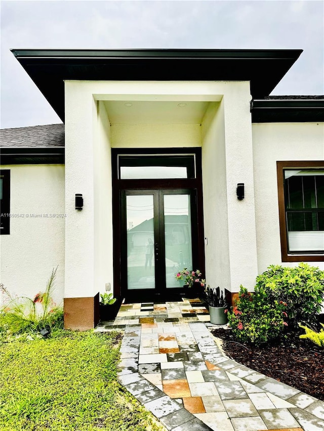 doorway to property featuring french doors