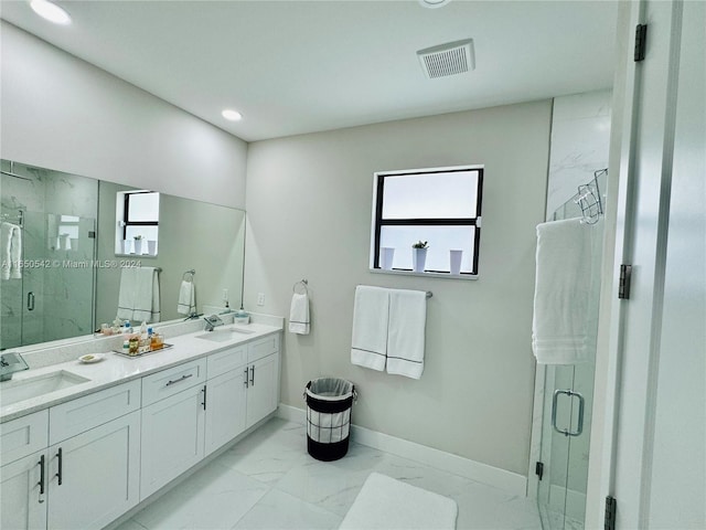 bathroom featuring vanity and walk in shower