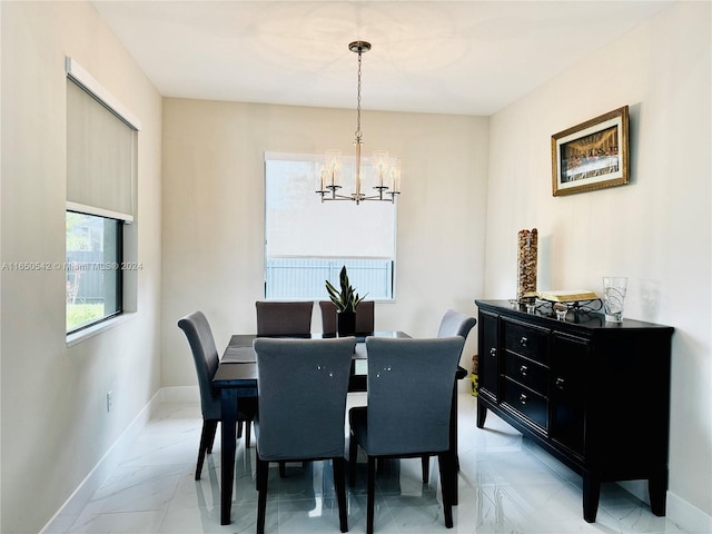 dining room featuring an inviting chandelier