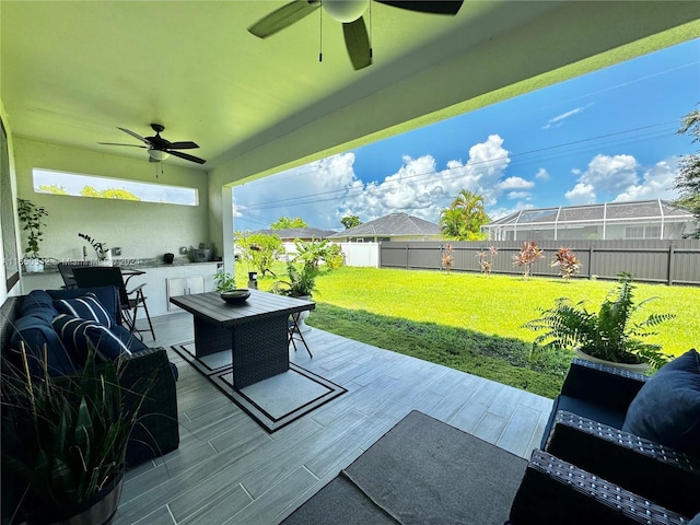 view of patio / terrace with ceiling fan