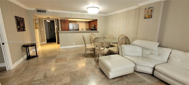 living room with ornamental molding