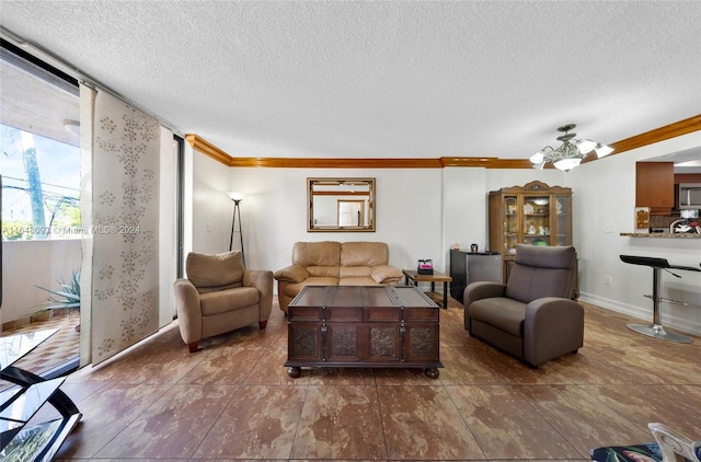 tiled living room featuring crown molding and a textured ceiling