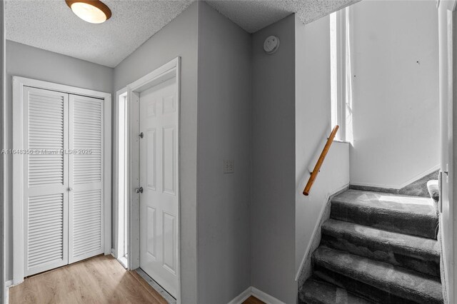 bathroom featuring vanity, toilet, hardwood / wood-style flooring, and lofted ceiling