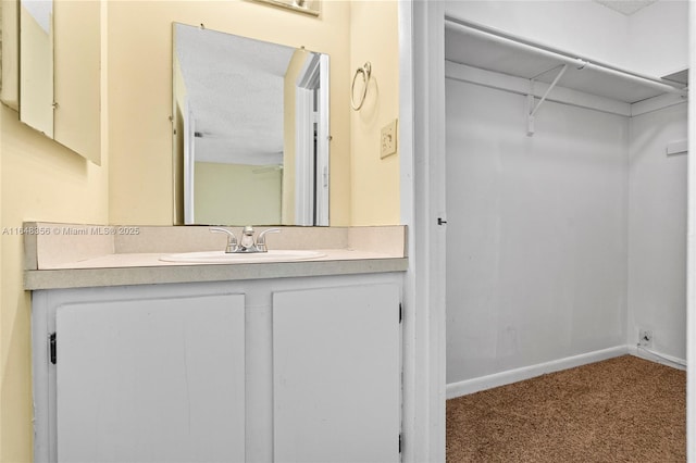 8145 Lagos De Campo Blvd Unit D-1, Tamarac, FL 33321 - bathroom featuring vanity and baseboards