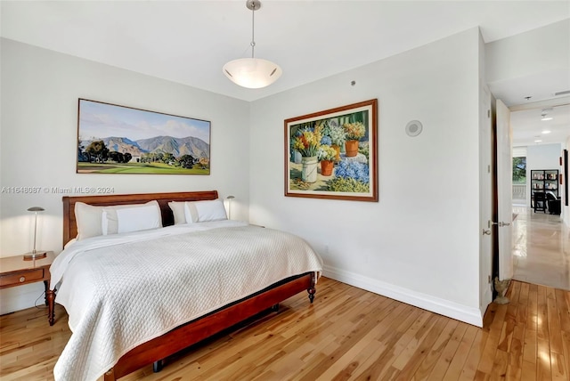 bedroom featuring light wood-type flooring