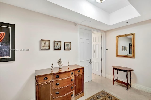 hallway featuring light tile patterned flooring