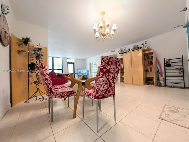 dining area featuring floor to ceiling windows, a notable chandelier, and light tile patterned floors