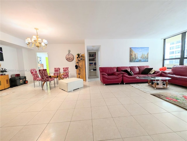 tiled living room with an inviting chandelier