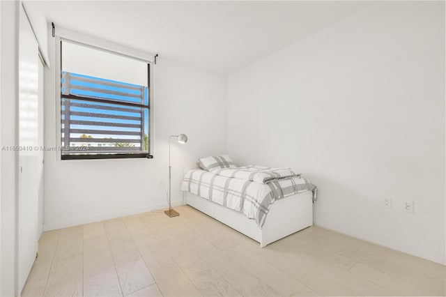 bedroom featuring light wood-type flooring