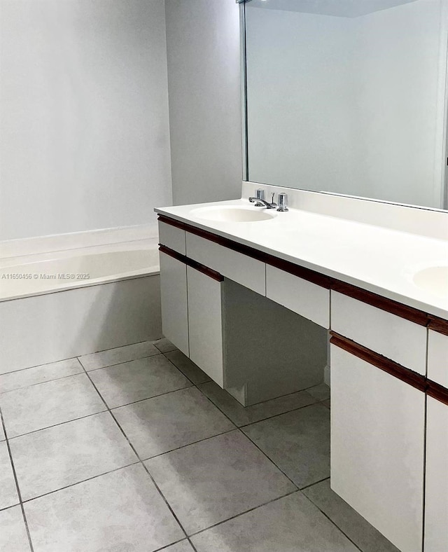 bathroom featuring tile patterned floors and vanity