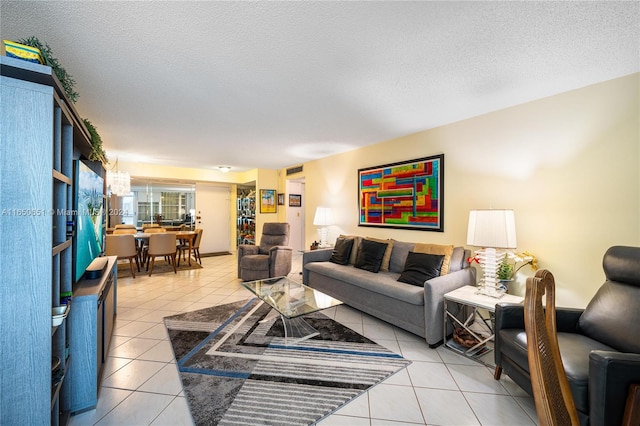 tiled living room with a textured ceiling