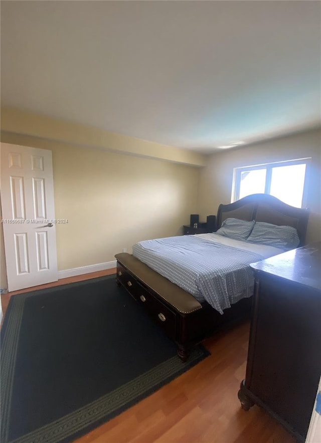 bedroom featuring hardwood / wood-style floors