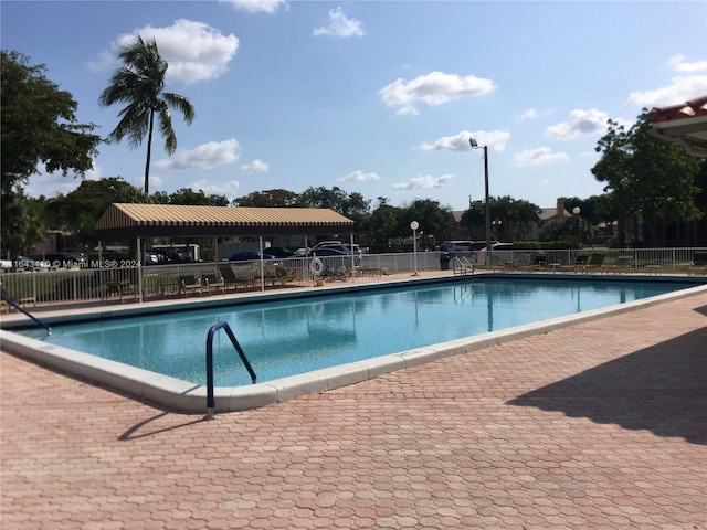 view of swimming pool with a gazebo