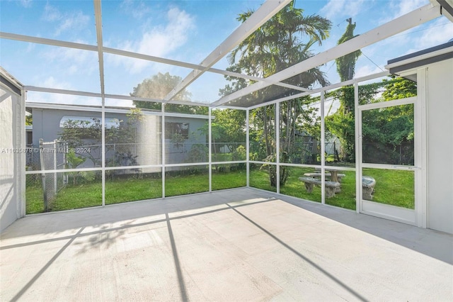 unfurnished sunroom featuring a healthy amount of sunlight