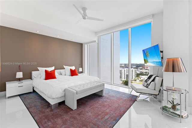 bedroom with floor to ceiling windows, ceiling fan, and access to outside