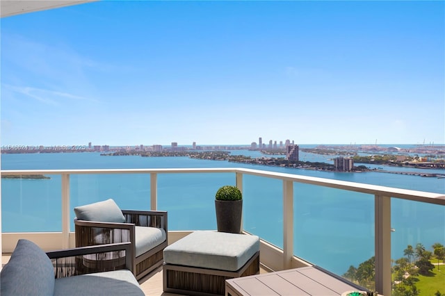 balcony featuring a water view