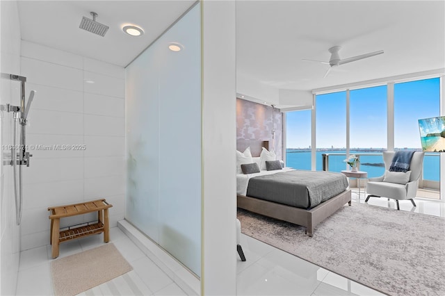 bedroom featuring floor to ceiling windows and ceiling fan