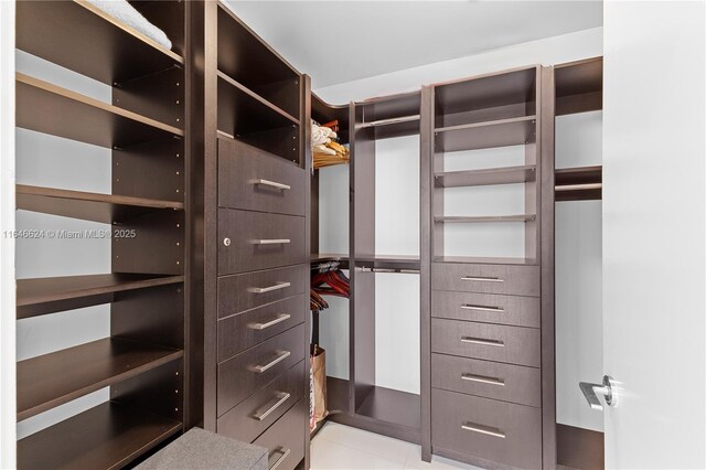 bedroom featuring a closet and tile patterned flooring